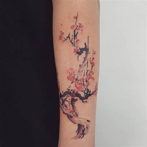 arm cherry blossom tattoo